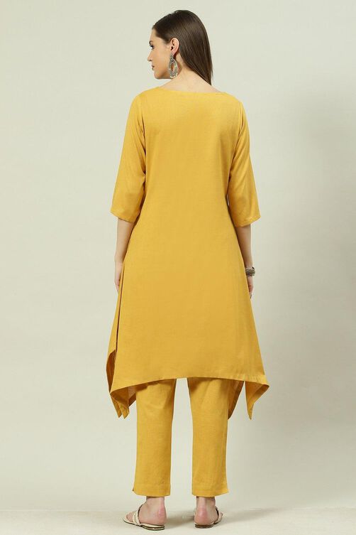 Yellow Solid Asymmetric Kurta Slim Pant Suit Set image number 4