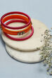 Orange & Pink Plastic & Thread Bangles image number 0