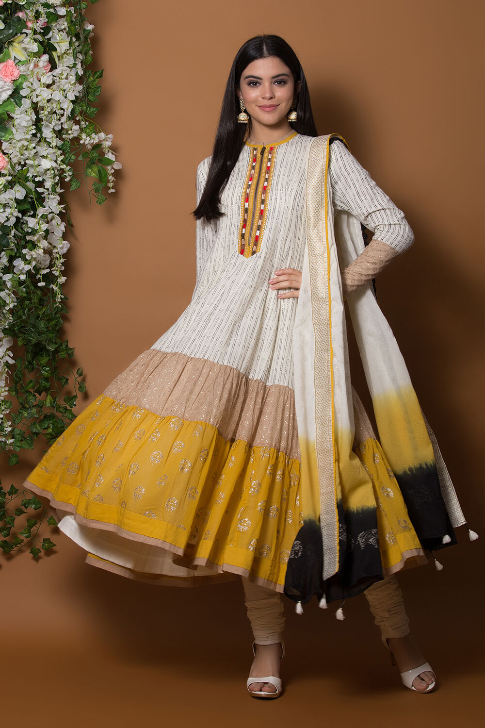 White And Black Flared Suit Set By Anju Modi