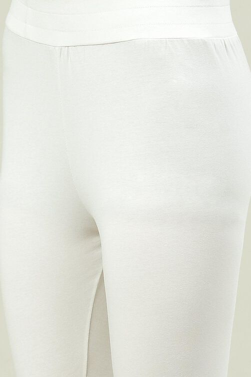 Buy Off White Cotton Blend Solid Leggings for INR699.00 |Biba India
