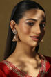 Gold Plated Brass Stone Studded Jhumkas image number 3