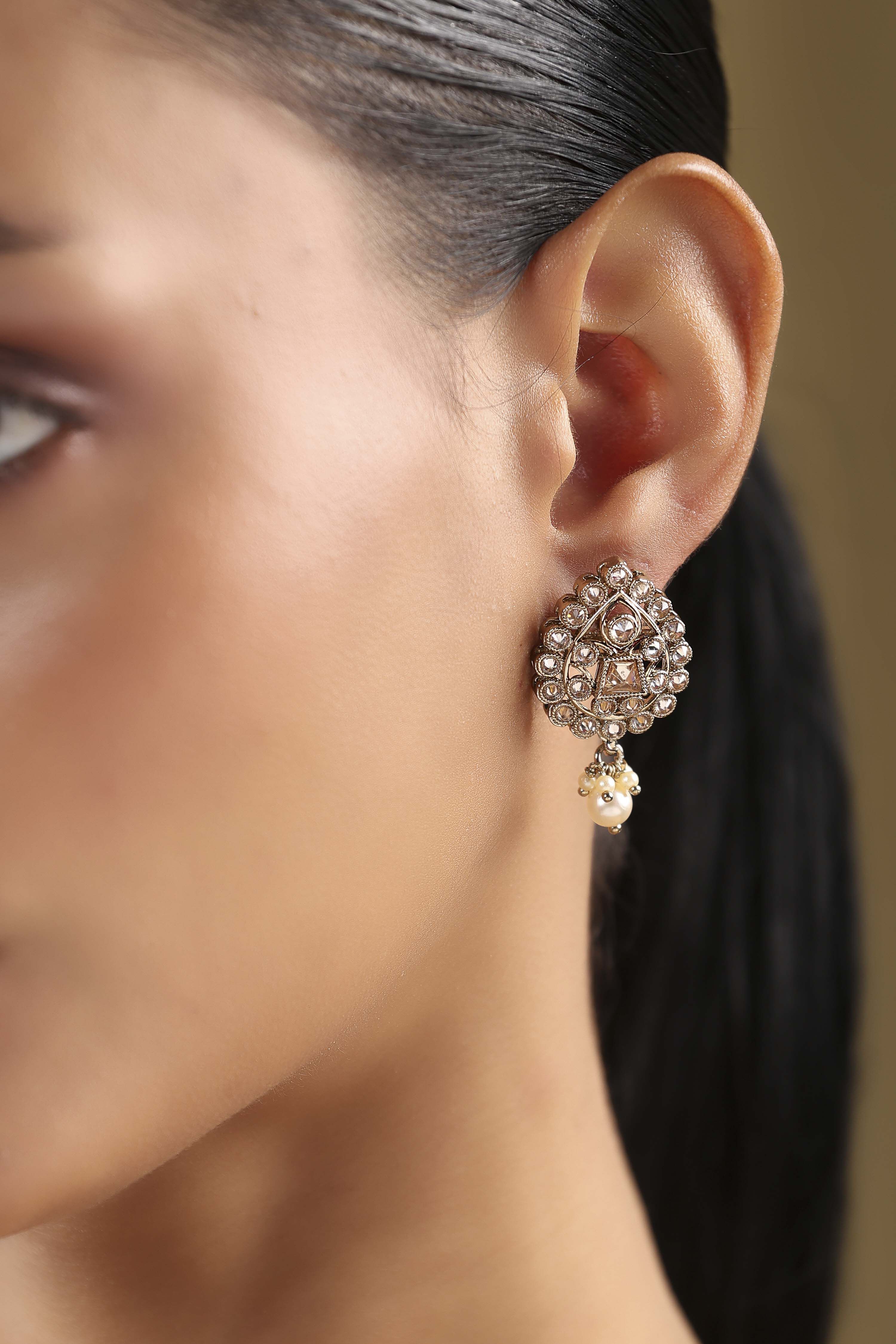 Champagne Gold Plated Alloy Stone Studded Drop Earrings image number 1