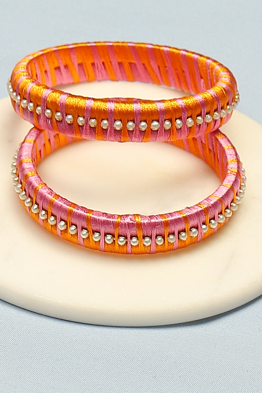 Orange colour thread bangles store