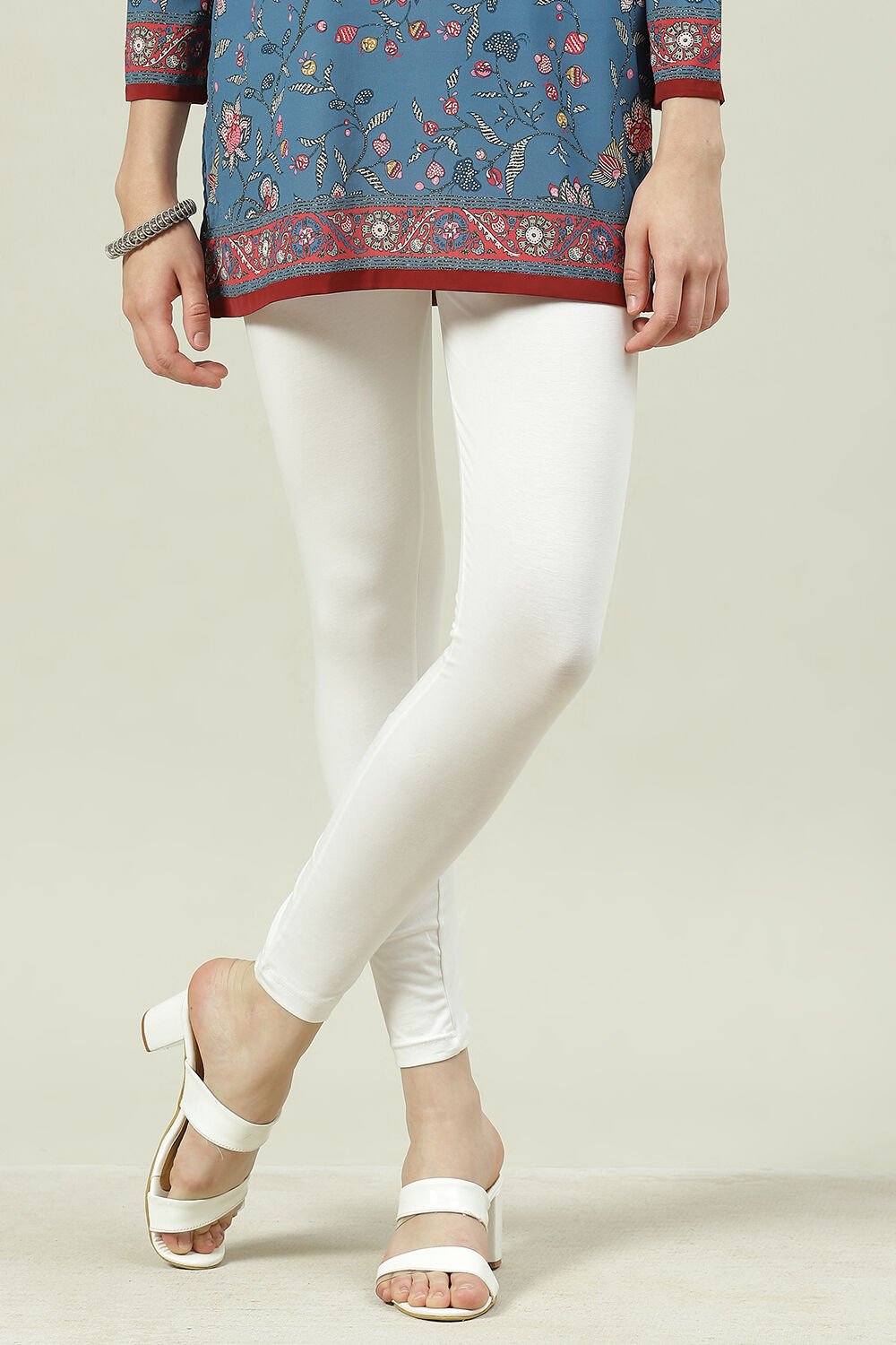 Off White Cotton Blend Solid Leggings at Biba India