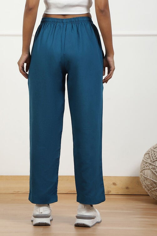 Beige Solid Mid-Rise Regular Pants image number 5