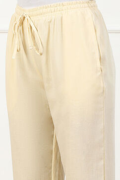 Cream-coloured Solid Mid-Rise Regular Fit Palazzo image number 1