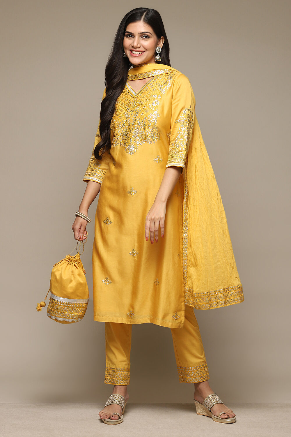 Biba yellow suit store