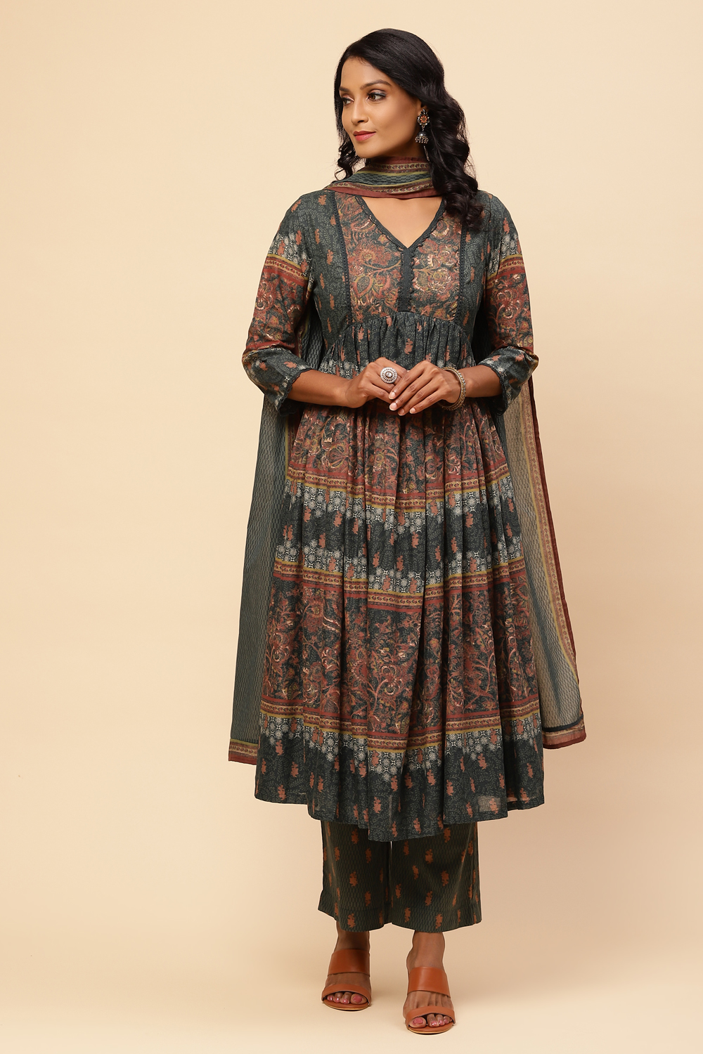 Dark Green Cotton Flared Kurta Slim Pant Suit Set image number 0