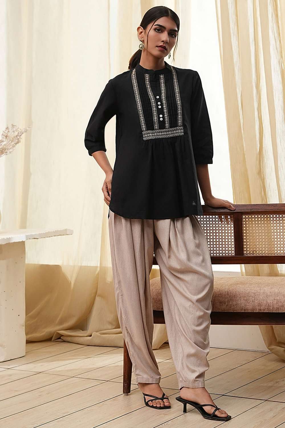 Beige Solid Straight Palazzos image number 0