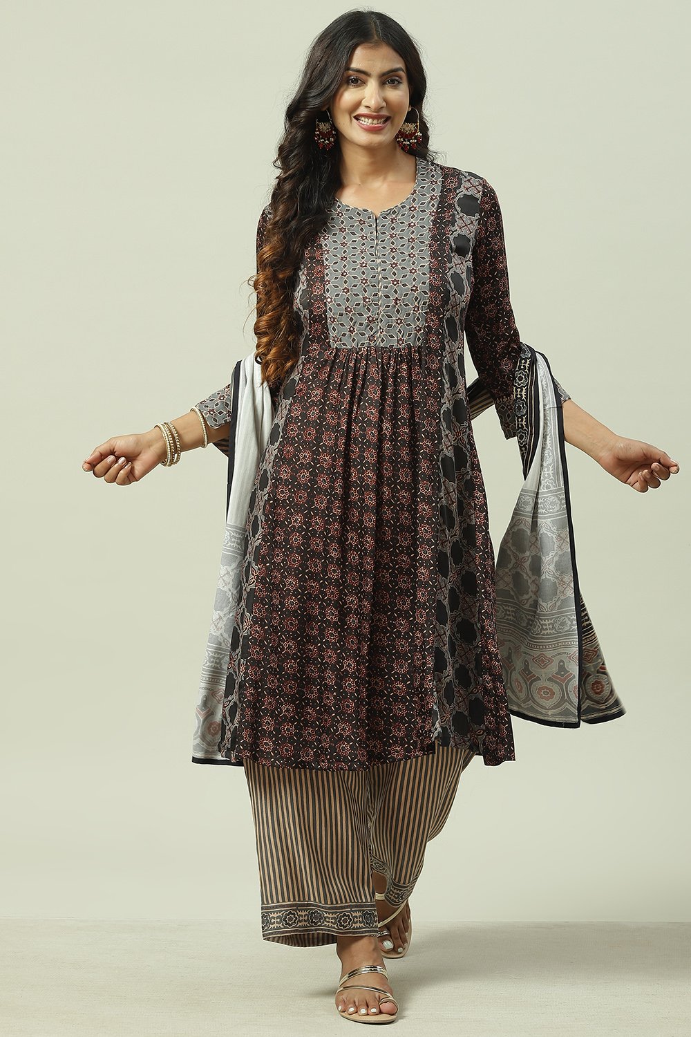Maroon and Green Viscose Flared Kurta Palazzo Suit Set image number 0