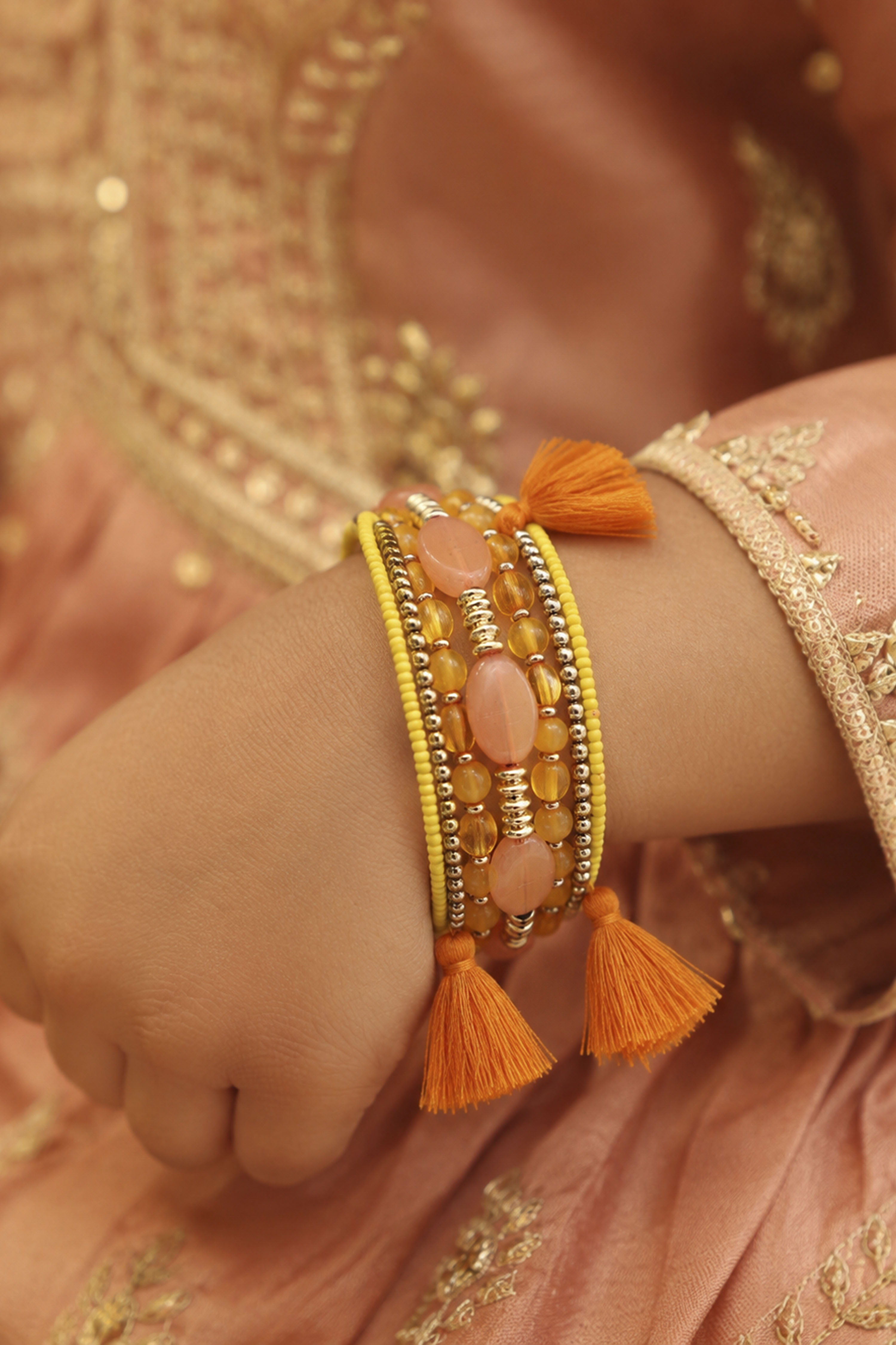 Yellow Beaded Plastic Wrap Around Bangle image number 1